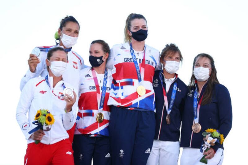 Silver medalists Agnieszka Skrzypulec and Jolanta Ogar of Team Poland, gold medalists Hannah Mills and Eilidh McIntyre of Team Great Britain, and bronze medalists Camille Lecointre and Aloise Retornaz of Team France pose with their medals for the Women's 470 class.