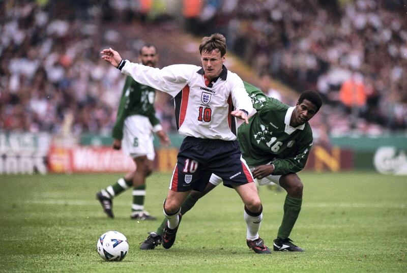 23 May 1998:  Teddy Sheringham of England is watched by Khamis Al-Owairan of Saudi Arabia during the International Friendly at Wembley in London. The match ended 0-0. \ Mandatory Credit: Ross Kinnaird /Allsport