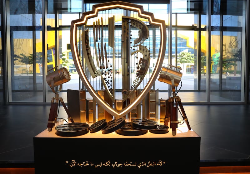 A glistening golden WB logo greets guests inside The WB Abu Dhabi. Photo: Hilton 