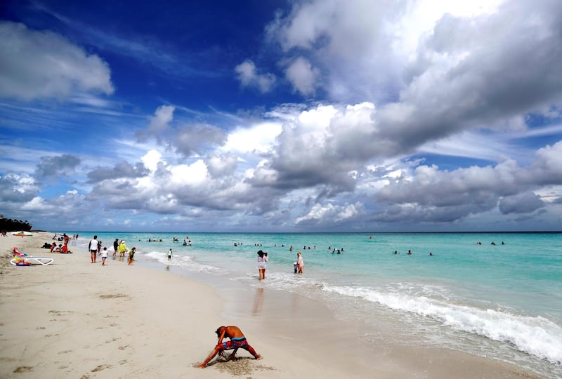 Foreign tourists bask in the sun as they enjoy a sparsely crowded beach in Varadero, Matanzas, Cuba.  EPA