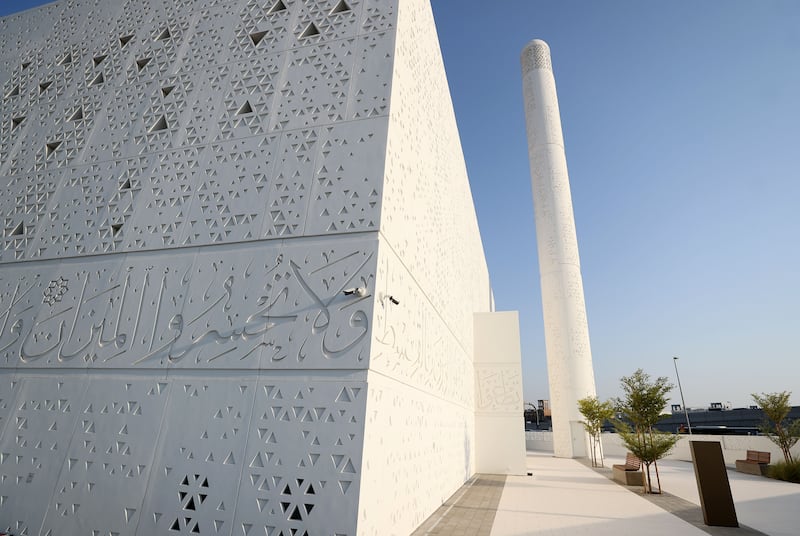 A passage from the Quran is moulded into the exterior facade of the building and, in a shift from tradition, the minaret is placed separately from the main mosque structure.