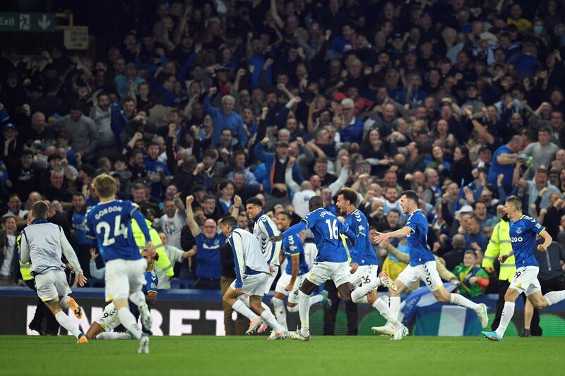 Everton's players celebrate at the end of the match. AFP