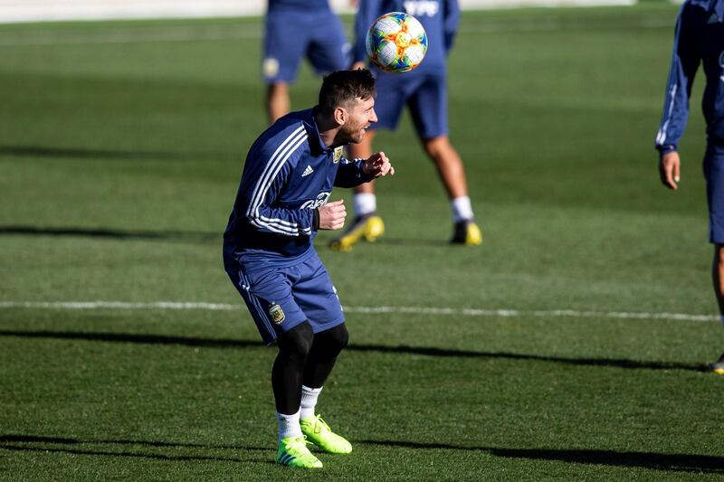 Argentina forward Lionel Messi takes part in heading practice. EPA