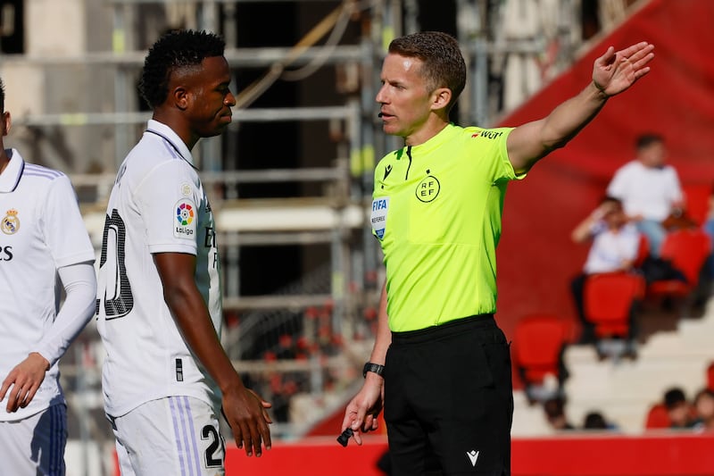 Real Madrid's Vinicius Junior remonstrates with referee Alejandro Hernandez. EPA