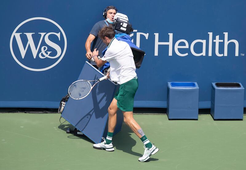 Daniil Medvedev runs into a TV camera during his match against Andrey Rublev at the Western and Southern Open at the Lindner Family Tennis Centre in Cincinatti on Saturday, August 21. Reuters