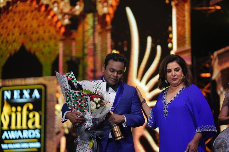 Composer A R Rahman being honoured by host Farah Khan Kunder.  