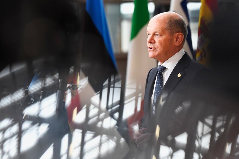 German Chancellor Olaf Scholz speaks to media before an extraordinary meeting of EU leaders to discuss Ukraine, energy and food security at the Europa building in Brussels. AP