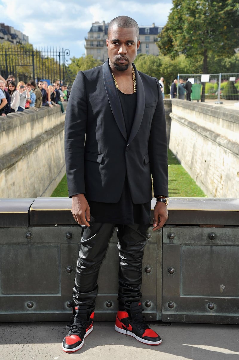 PARIS, FRANCE - SEPTEMBER 28: Kanye West arrives at the Christian Dior Spring / Summer 2013 show as part of Paris Fashion Week on September 28, 2012 in Paris, France.  (Photo by Pascal Le Segretain/Getty Images)