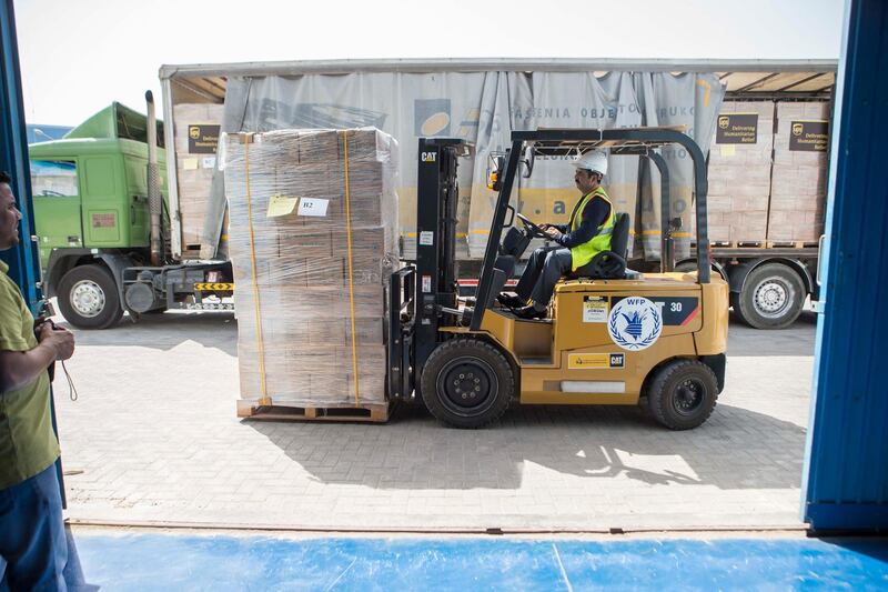 DUBAI, UNITED ARAB EMIRATES, 19 APRIL 2017. The World Food Programme loads trucks with food and supplies in response to the drought in Somalia at the International Humanitarian City Warehouses in Dubai. (Photo: Antonie Robertson/The National) ID: 74643. Journalist: Caline Malek. Section: National. *** Local Caption ***  AR_1904_World_Food_Programme-03.JPG