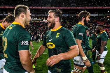 Frans Steyn, with Andre Esterhuizen, celebrates South Africa's Rugby Championship win over Australia. Getty