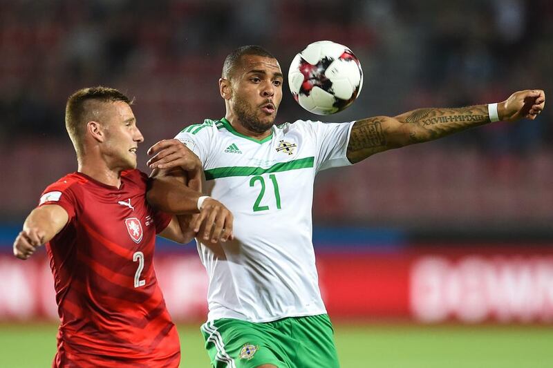 Josh Magennis, right, in action for Northern Ireland during 2018 World Cup qualifying, plies his club trade at League One club Charlton Athletic, England's third tier. Filip Singer / EPA