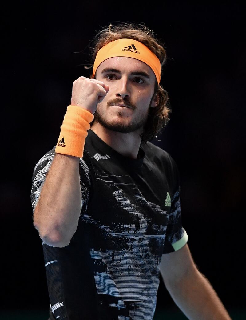 Tsitsipas celebrates making his first ATP Final after beating Roger Federer. Getty