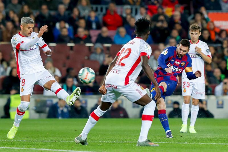 Lionel Messi scores his first and Barca's second. AP