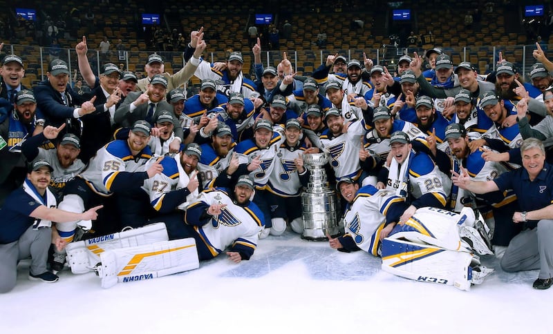 The St. Louis Blues celebrate with the Stanley Cup after they defeated the Boston Bruins in Game 7 of the NHL Stanley Cup Final in Boston. AP Photo