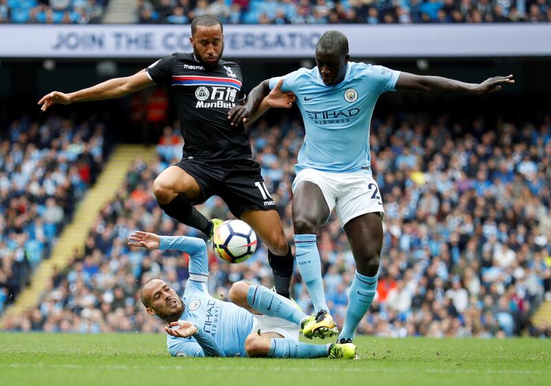 Manchester City's Benjamin Mendy and David Silva in action with Crystal Palace's Andros Townsend. Phil Noble / Reuters