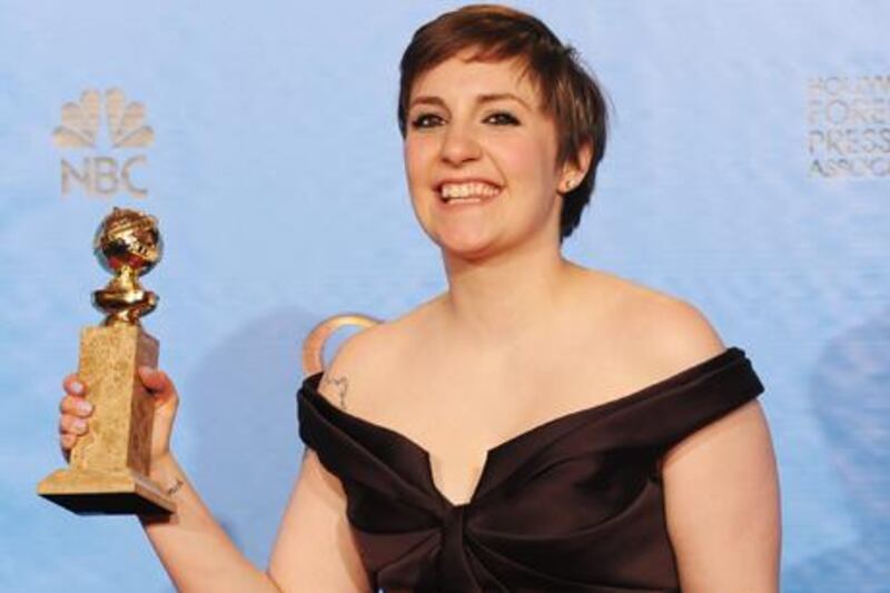 Actress Lena Dunham, winner of Best Actress in a Television Series (Musical or Comedy) for Girls. Kevin Winter / Getty Images / AFP