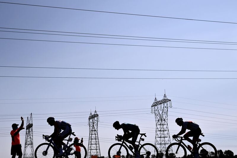 Riders compete during Stage 15. AFP