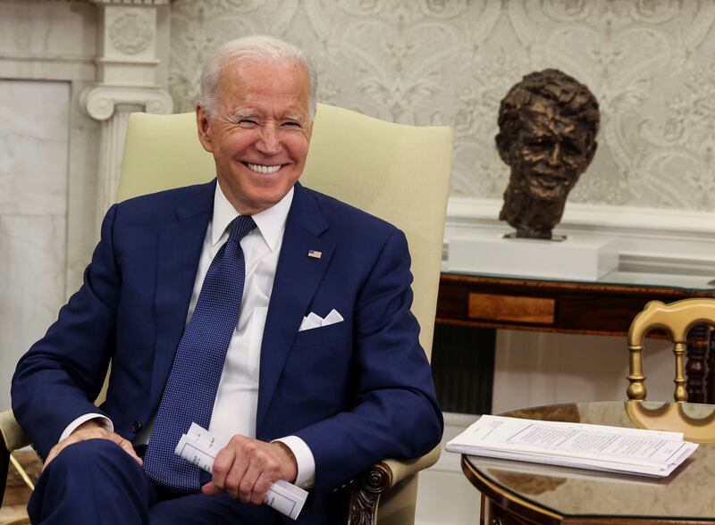 US President Joe Biden smiles during during a bilateral meeting with Iraq's Prime Minister Mustafa Al Kadhimi at the White House.