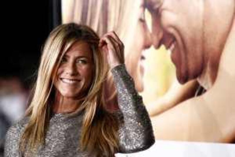 Cast member Jennifer Aniston arrives at the premiere of "Love Happens" in Los Angeles on Tuesday, Sept. 15, 2009. (AP Photo/Matt Sayles)