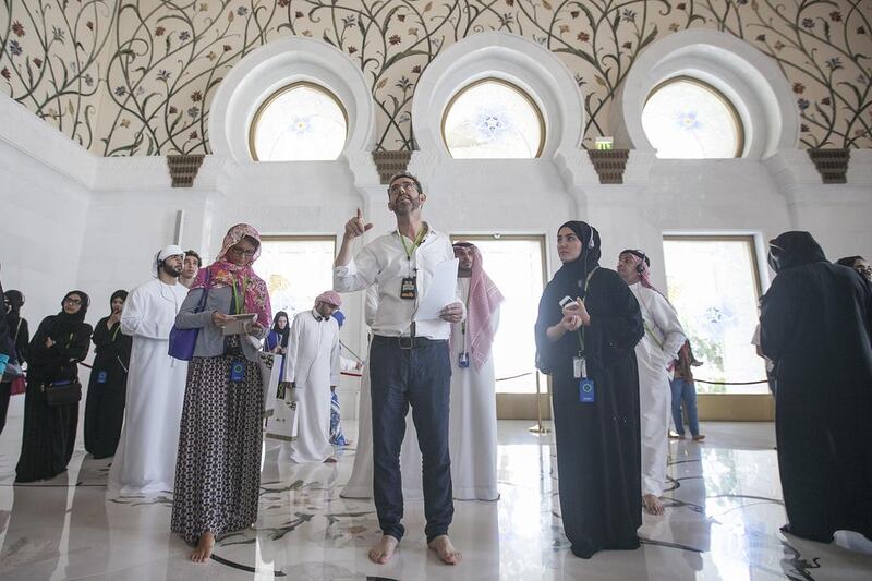 British architectural designer Kevin Dean tours the Sheikh Zayed Grand Mosque, discussing his work. Mona Al Marzooqi / The National