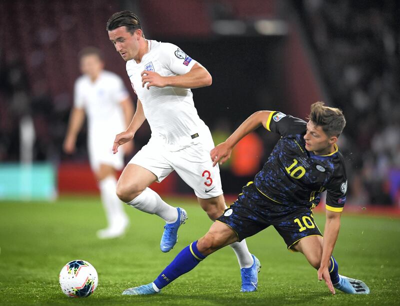 SOUTHAMPTON, ENGLAND - SEPTEMBER 10: Ben Chilwell of England is tackled by Florent Muslija of Kosovo during the UEFA Euro 2020 qualifier match between England and Kosovo at St. Mary's Stadium on September 10, 2019 in Southampton, England. (Photo by Clive Mason/Getty Images)
