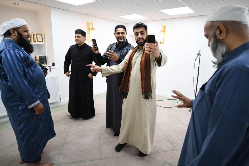 Members of the Muslim community attend the opening of the first mosque built on the Western Isles, Stornoway, Scotland, on May 11, 2018. Jeff J Mitchell / Getty Images