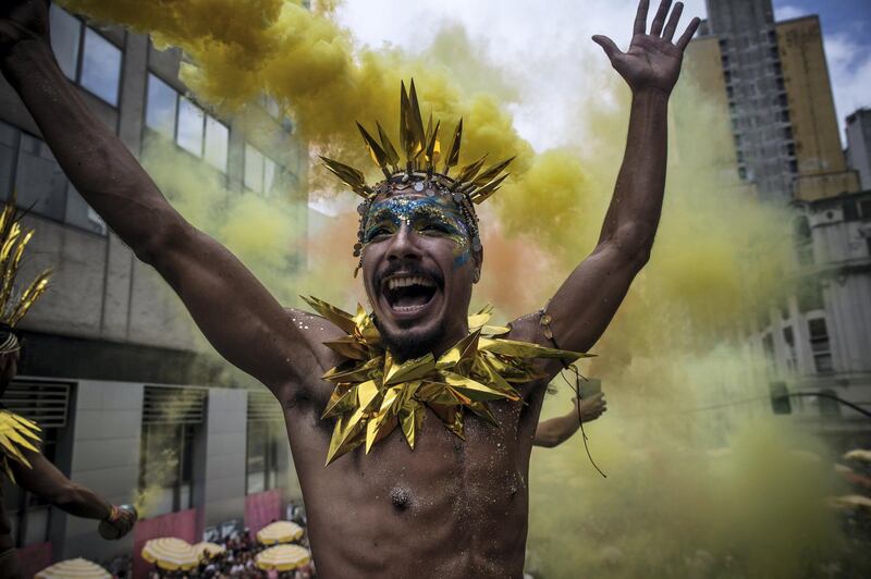 SAO PAULO, BRAZIL - MARCH 02: Revellers participate in the Carnival group "Bloco Tarado Ni VocÃª" parade honoring the brazilian singer Caetano Veloso through the streets of downtown on March 2, 2019, in SÃ£o Paulo, Brazil.  (Photo by Victor Moriyama/Getty Images)