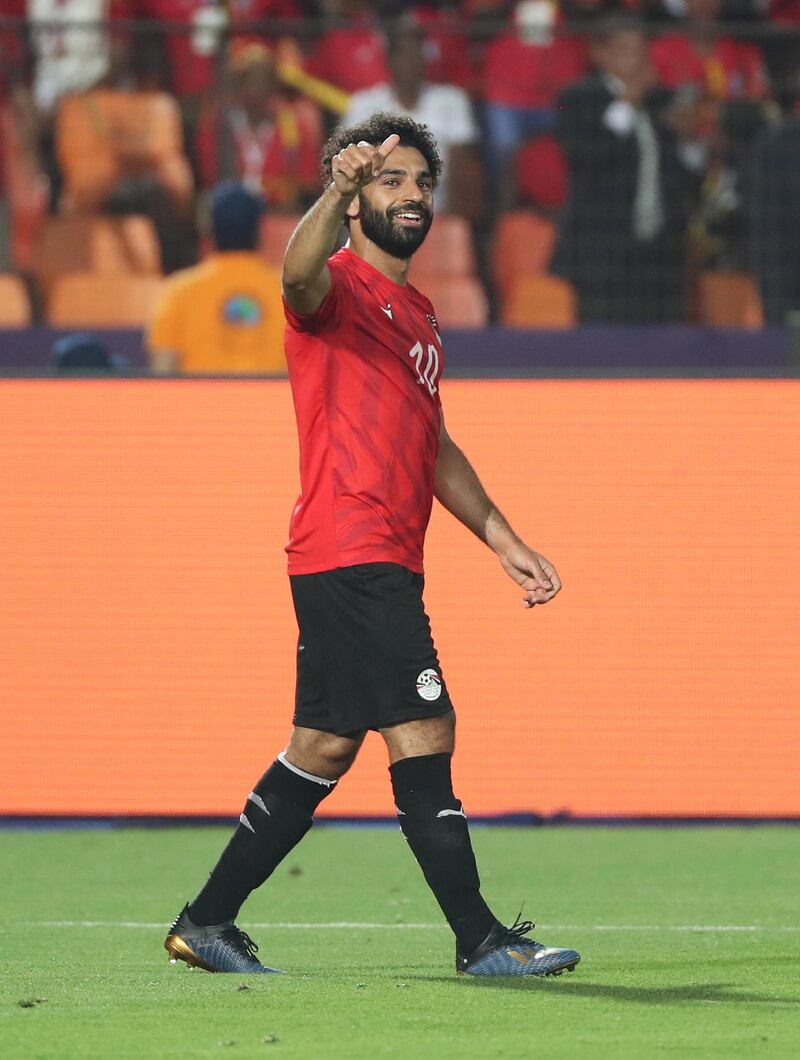 epa07675890 Mohamed Salah of Egypt celebrates a goal during the 2019 Africa Cup of Nations (AFCON) group A soccer between Egypt and DR Congo in Cairo, Egypt, 26 June 2019.  EPA/GAVIN BARKER