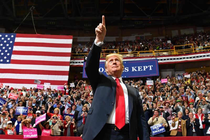 Donald Trump arrives for a "Make America Great Again" campaign rally at McKenzie Arena, in Chattanooga, Tennessee. AFP