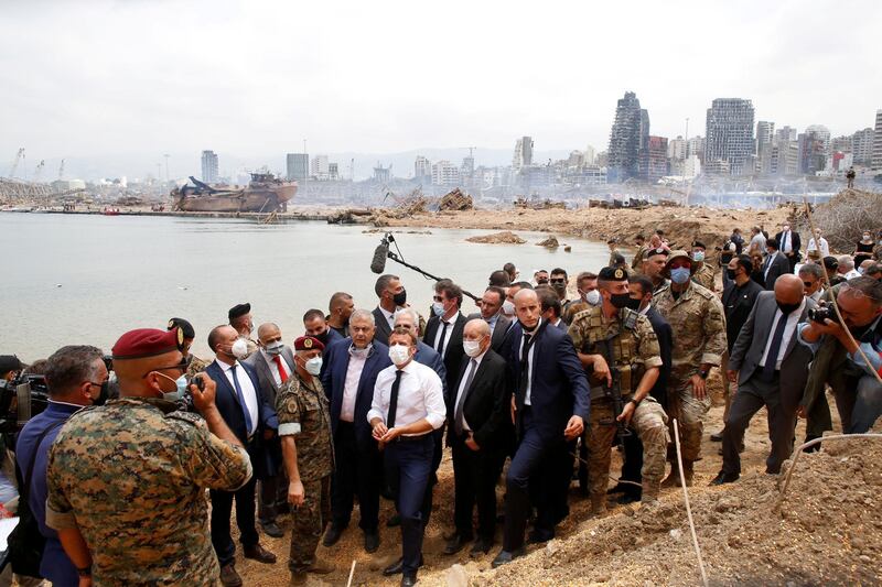 French President Emmanuel Macron visits the devastated site of the explosion at the port of Beirut.  REUTERS