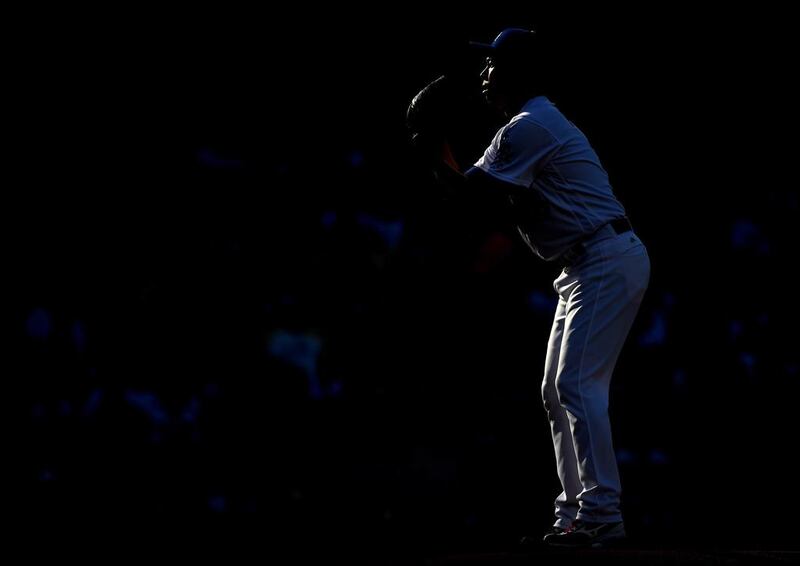Kenta Maeda, number 18 for the Los Angeles Dodgers, prepares to pitch to the Arizona Diamondbacks during the first inning at Dodger Stadium. Harry How / Getty Images / AFP
