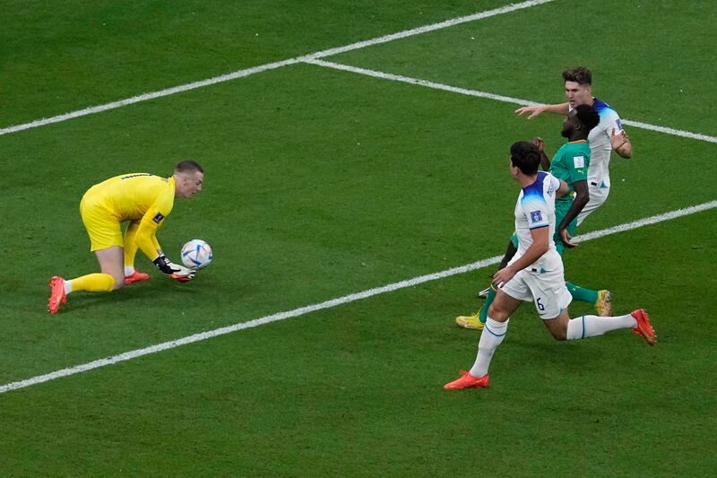 England's goalkeeper Jordan Pickford makes a save. AP 