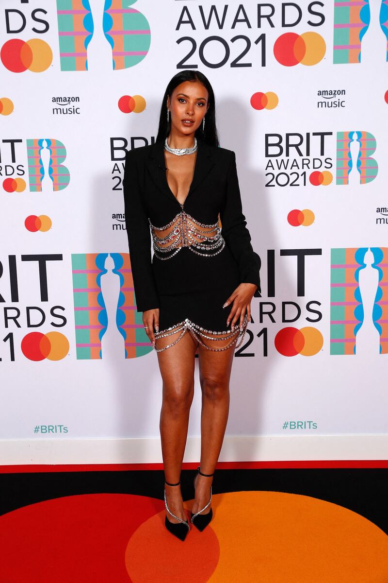 Host Maya Jama wore an embellished blazer dress by Area for the Brit Awards 2021. AFP