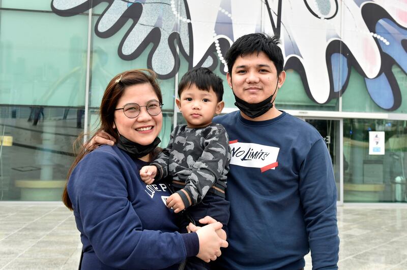 Ronald Benson from the Philippines and his wife and son enjoy a visit to the aquarium and maritime museum during the long weekend.