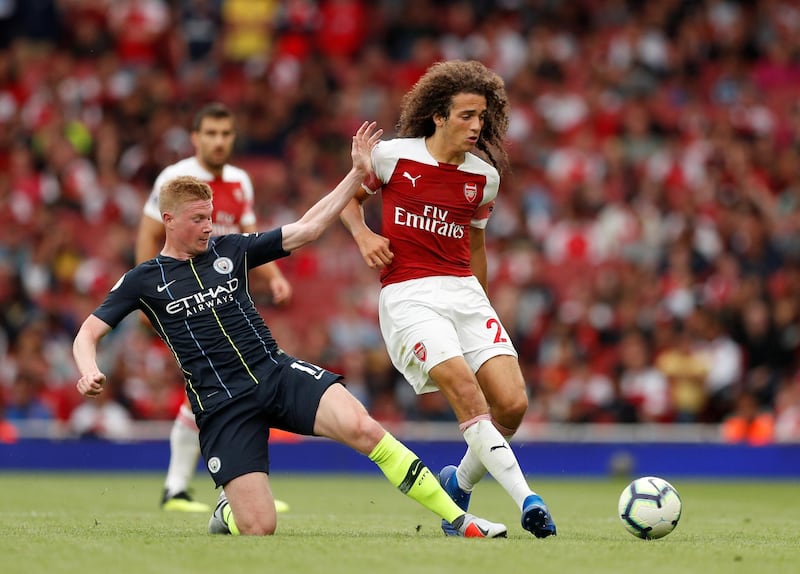Soccer Football - Premier League - Arsenal v Manchester City - Emirates Stadium, London, Britain - August 12, 2018   Arsenal's Matteo Guendouzi in action with Manchester City’s Kevin De Bruyne   Action Images via Reuters/John Sibley    EDITORIAL USE ONLY. No use with unauthorized audio, video, data, fixture lists, club/league logos or "live" services. Online in-match use limited to 75 images, no video emulation. No use in betting, games or single club/league/player publications.  Please contact your account representative for further details.