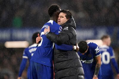 Chelsea's Benoit Badiashile embraces manager manager Mauricio Pochettino. PA