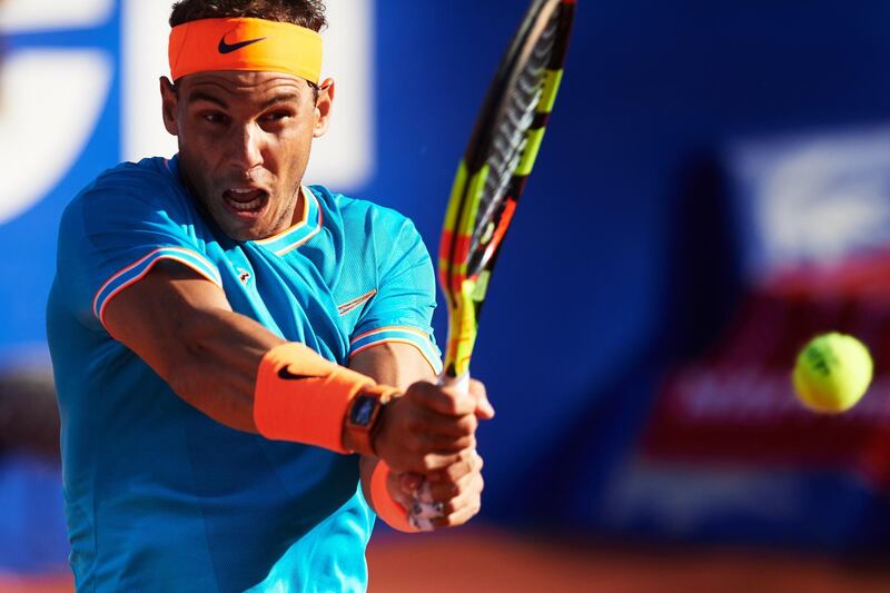 BARCELONA, SPAIN - APRIL 26: Rafael Nadal of Spain plays a backhand against Jan-Lennard Struff of Germany during their quarter final match during day five of the Barcelona Open Banc Sabadell at Real Club De Tenis Barcelona on April 26, 2019 in Barcelona, Spain. (Photo by Alex Caparros/Getty Images)