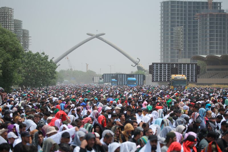 Followers of Shiite cleric and political leader Moqtada Al Sadr gather for mass prayers inside Baghdad's Green Zone. AP
