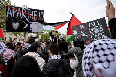 epa09202186 Participants rally as they gather on 'Day of the Naqba' at Heumarkt in Cologne, Germany, 15 May 2021. Nakba means catastrophe, referring to the flight and expulsion of Arab people from the British Mandate territory of Palestine until the 1949 armistice following the Palestine War, which was waged by six Arab states against the state of Israel, founded on 14 May 1948. The escalated Middle East conflict between the state of Israel and the Palestinians is also echoing in North Rhine-Westphalia. Pro-Palestine demonstrations and rallies against anti-Semitism have been registered throughout Germany.  EPA/SASCHA STEINBACH