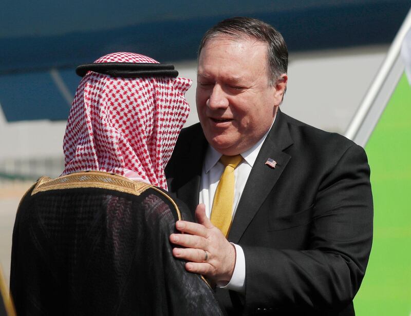 Mr Pompeo greets Mr Al Jubeir after arriving in Riyadh. AP Photo