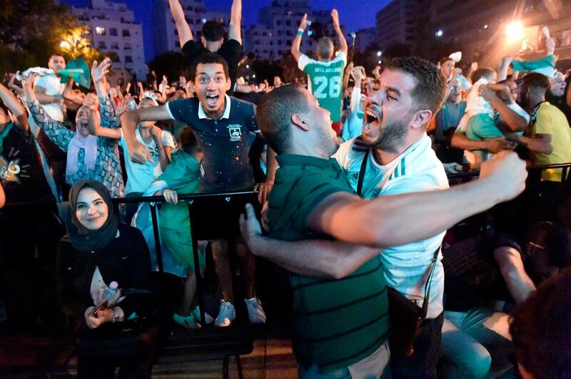 Algeria supporters celebrate at the Grande Poste place, Algiers. AFP