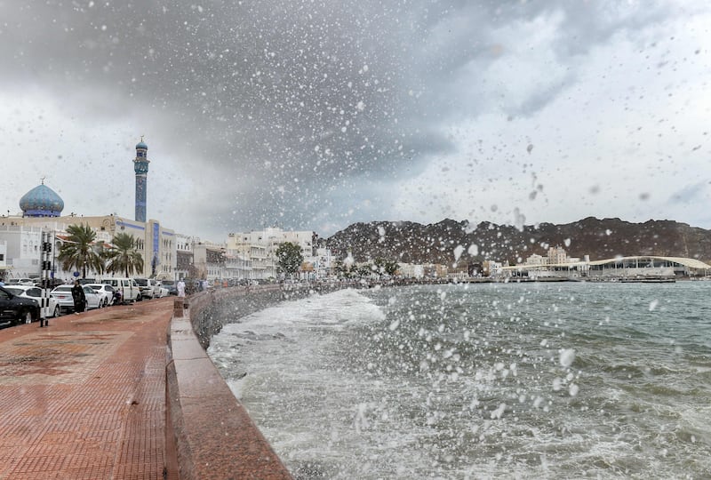 High waves break on the Mutrah seaside promenade in Muscat.