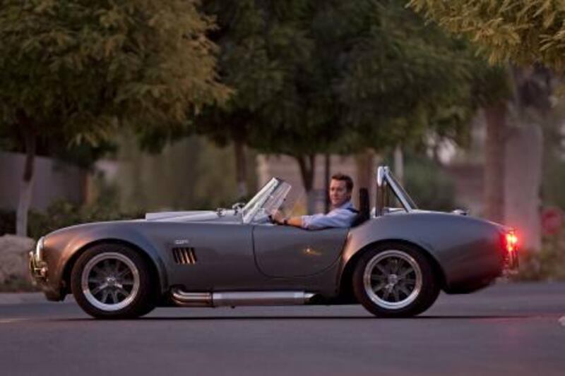 Dubai, August 22, 2011 - Tom Abram with his AC Shelby Cobra replica which he built from a kit at his home in Dubai, August 22, 2011. (Jeff Topping/The National) 