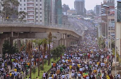 Supporters of Ethiopia Prime Minister attend a rally on Meskel Square in Addis Ababa on June 23, 2018. A blast at a rally in Ethiopia's capital today in support of new Prime Minister Abiy Ahmed killed several people, state media quoted the premier as saying. / AFP / SAMUEL HABTAB GEBRU
