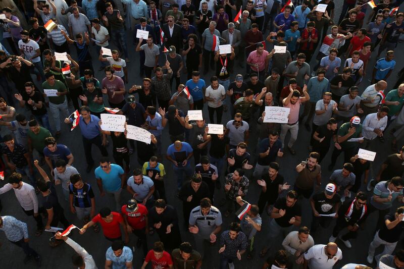 People gather during a protest in Kerbala, Iraq. Reuters