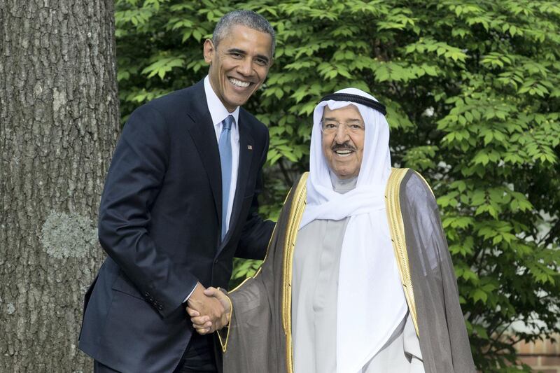 epa04748980 US President Barack Obama (L) shakes hands with Sheikh Sabah Al-Ahmad Al-Jaber Al-Sabah (R), Amir of the State of Kuwait, at Camp David, Maryland, USA, 14 May 2015. Obama met with  leaders from six Gulf nations; Bahrain, Kuwait, Oman, Qatar, Saudi Arabia and the United Arab Emirates to discuss security cooperation in the face of regional conflicts.  EPA/MICHAEL REYNOLDS *** Local Caption *** 51934264