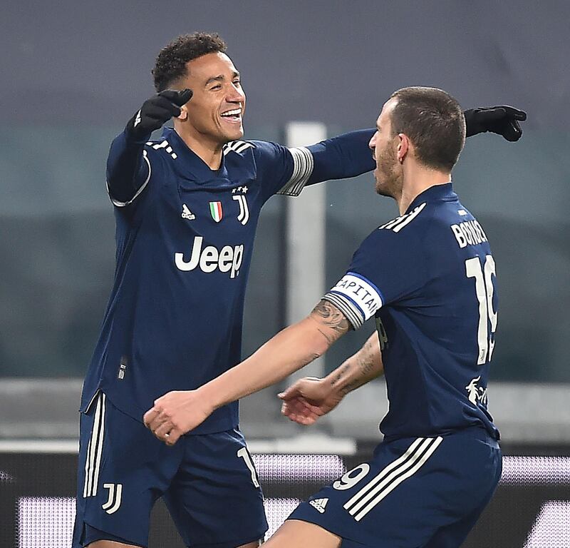 Danilo (L) celebrates after scoring Juve's  first goal. EPA