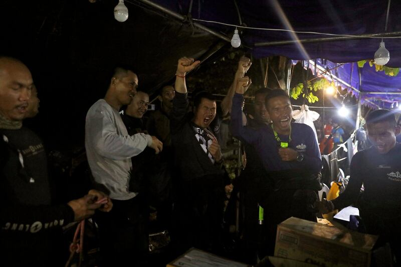 Thailand's Navy Seal celebrating  near the Tham Luang cave complex, as members of under-16 soccer team and their coach have been found alive according to a local media's report  in the northern province of Chiang Rai, Thailand, July 2, 2018. REUTERS/Soe Zeya Tun