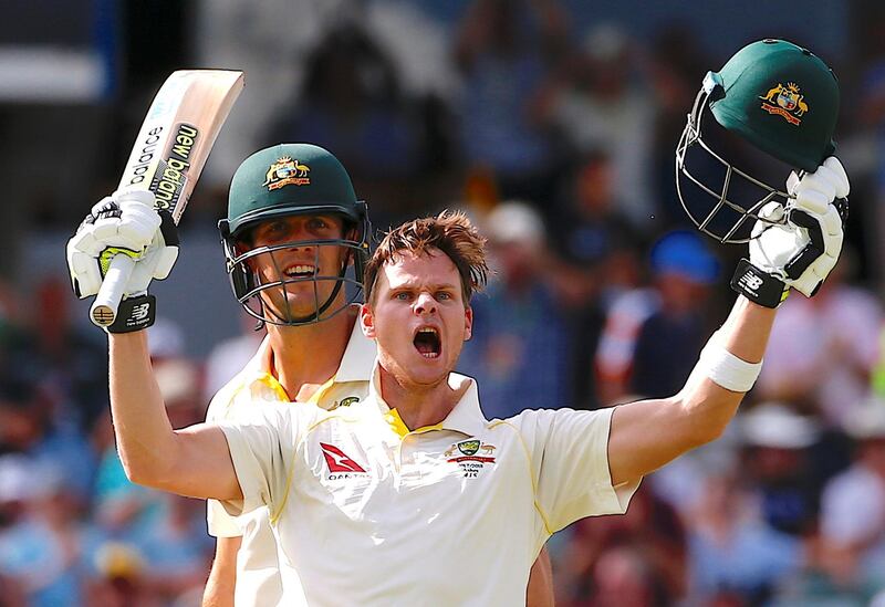 Cricket - Australia v England - Ashes test match - WACA Ground, Perth, Australia, December 16, 2017 - Australia's captain Steve Smith celebrates with team mate Mitchell Marsh after reaching his double century during the third day of the third Ashes cricket test match.    REUTERS/David Gray