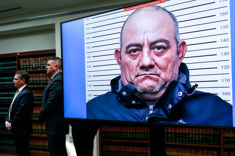 A picture of Colombian drug lord Dairo Antonio Usuga, aka Otoniel, is displayed at a press conference in New York on May 5. AFP
